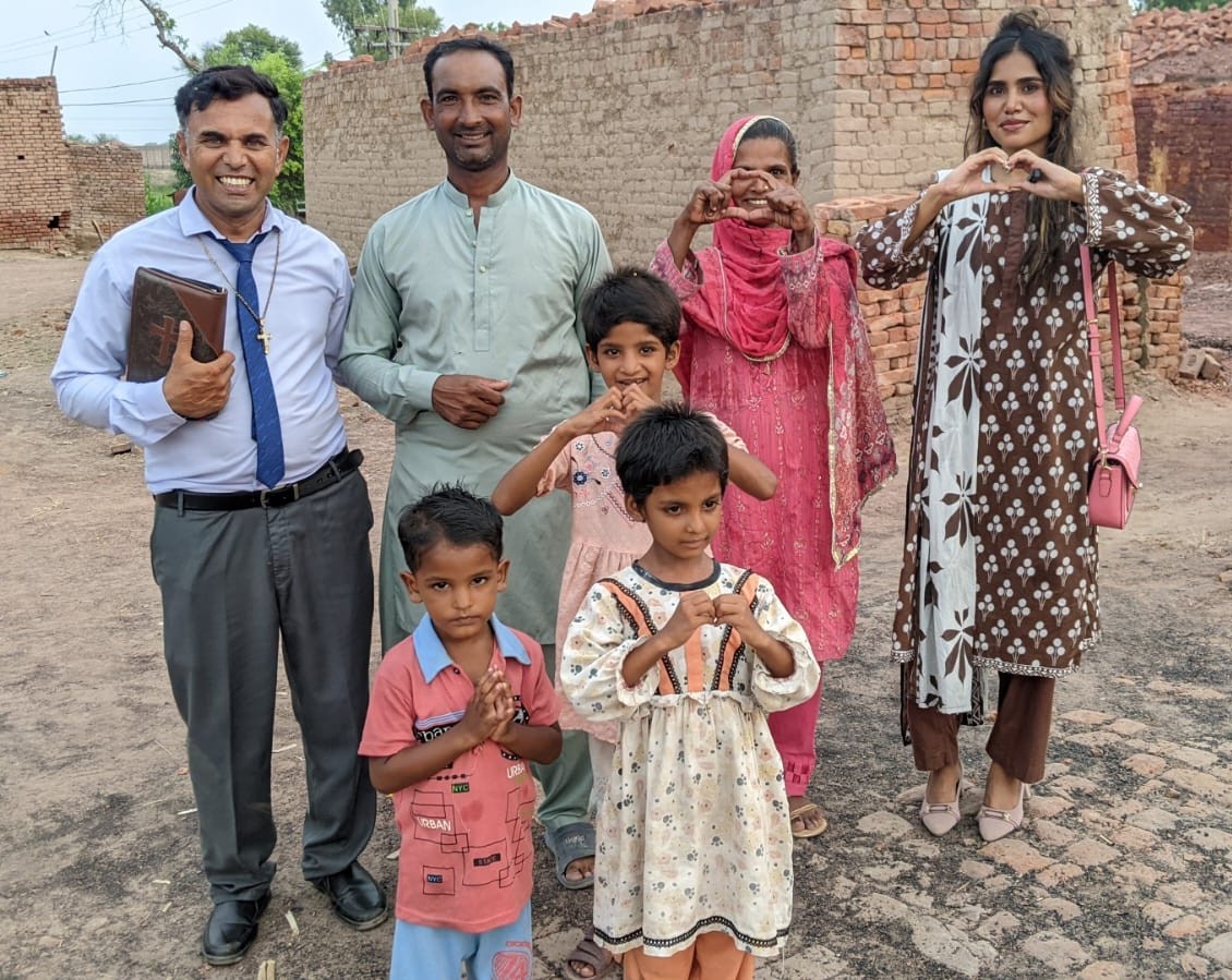 Yasir Masih's family celebrating together after being freed from bonded labor